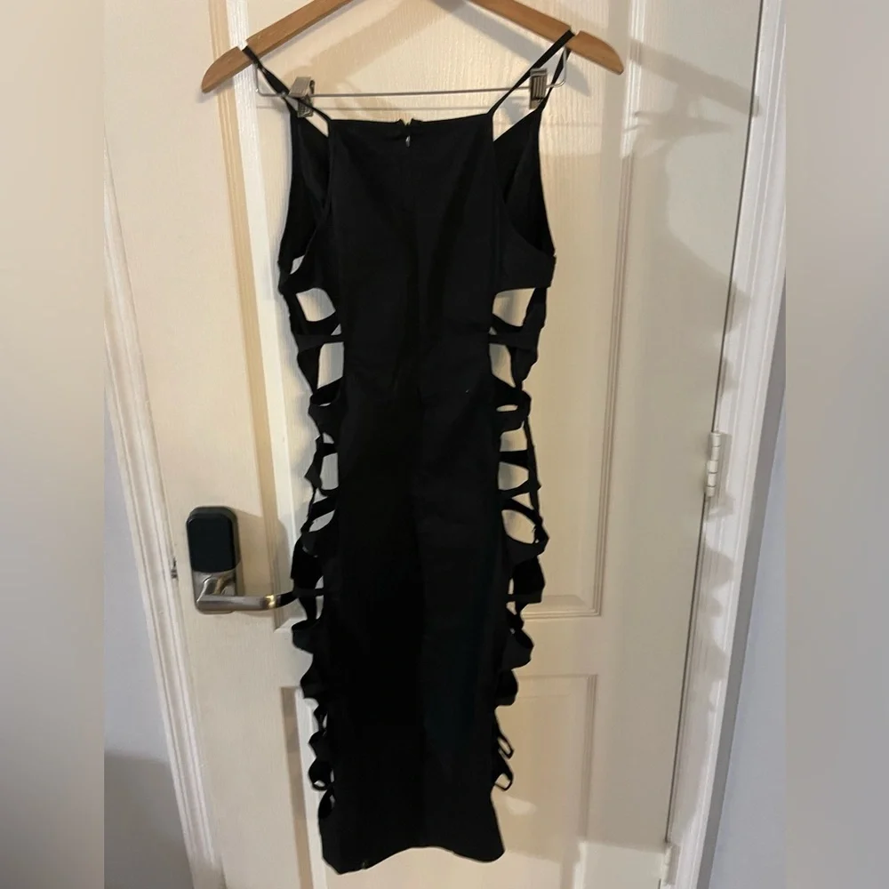 Elegant Black Backless Dress with Unique Cut-Outs - Picture 2 of 5